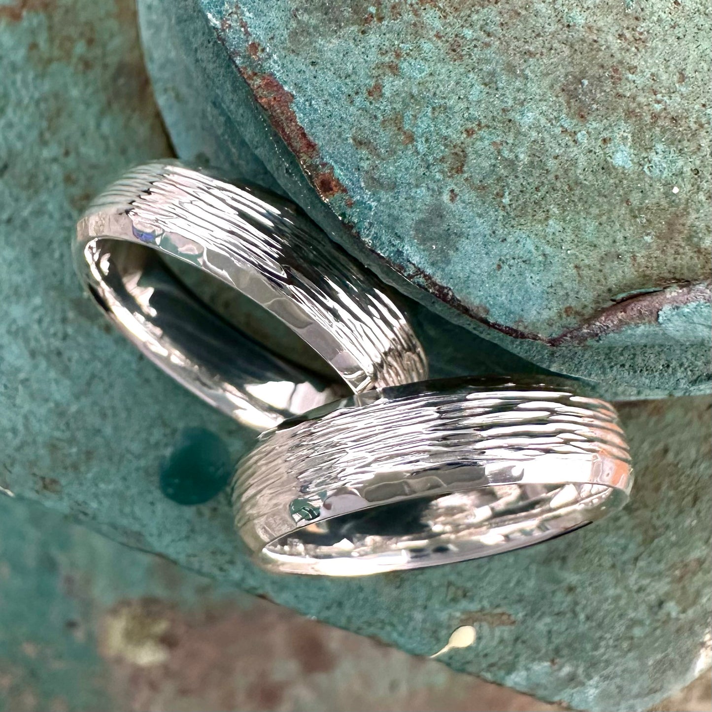 Travis and Travis' Wedding Bands