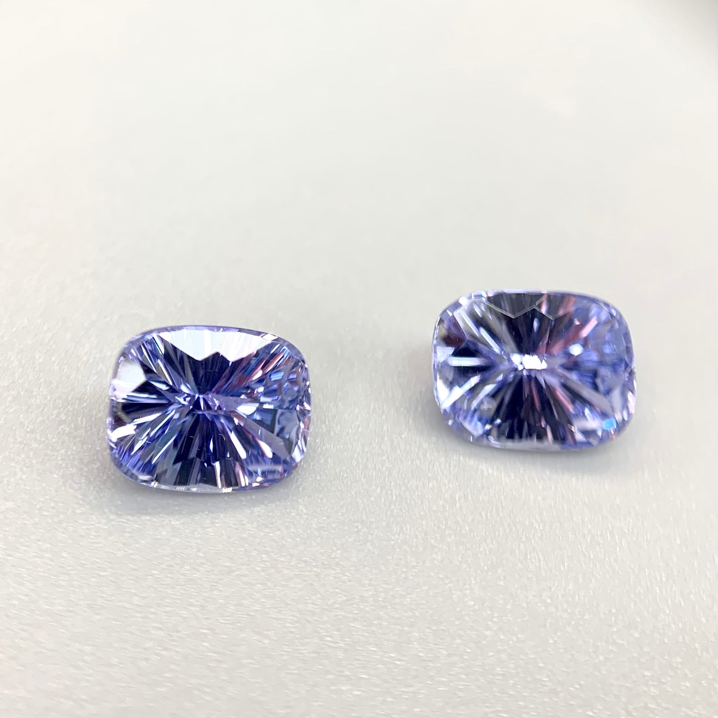 Pair of Concave cut Blue Sapphires 3.18tcw