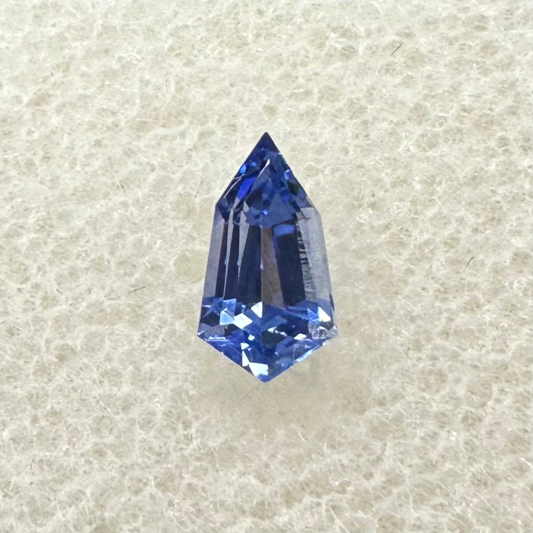 Shield shaped blue sapphire .58ct